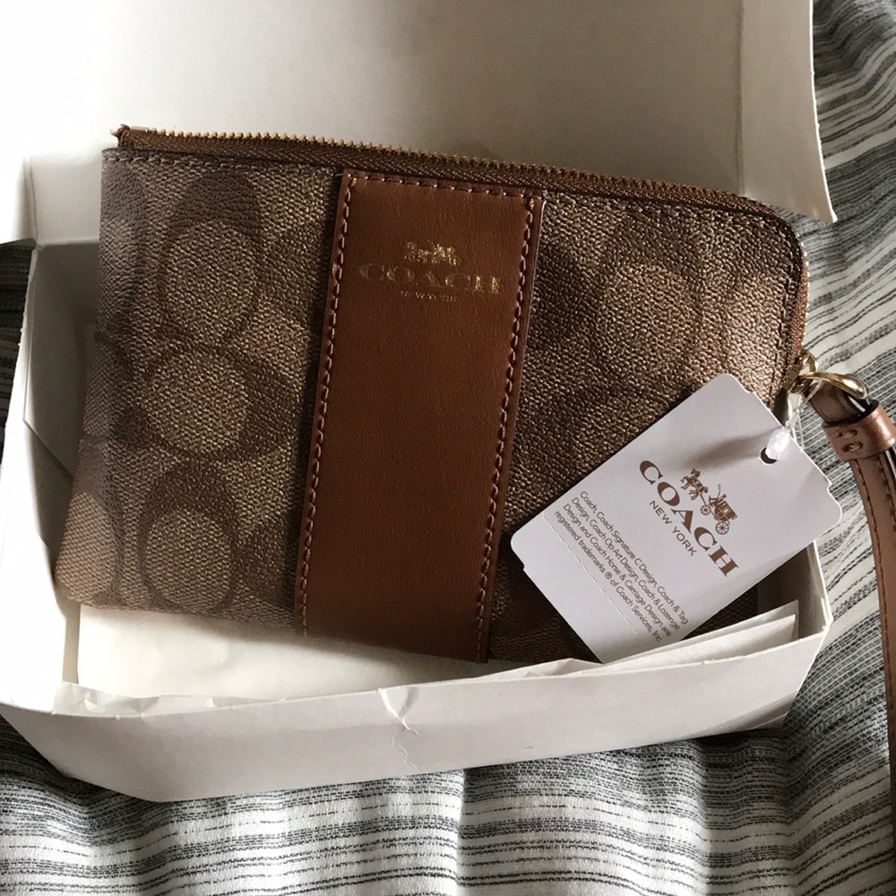 Coach khaki saddle small wristlet